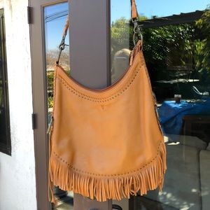 Adjustable extra large fringe purse by Frye.